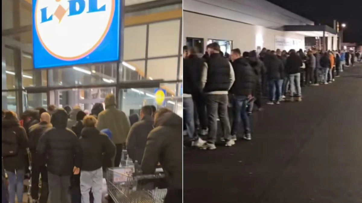 Clienți așteptând la coadă în fața magazinelor din Germania înainte de Revelion