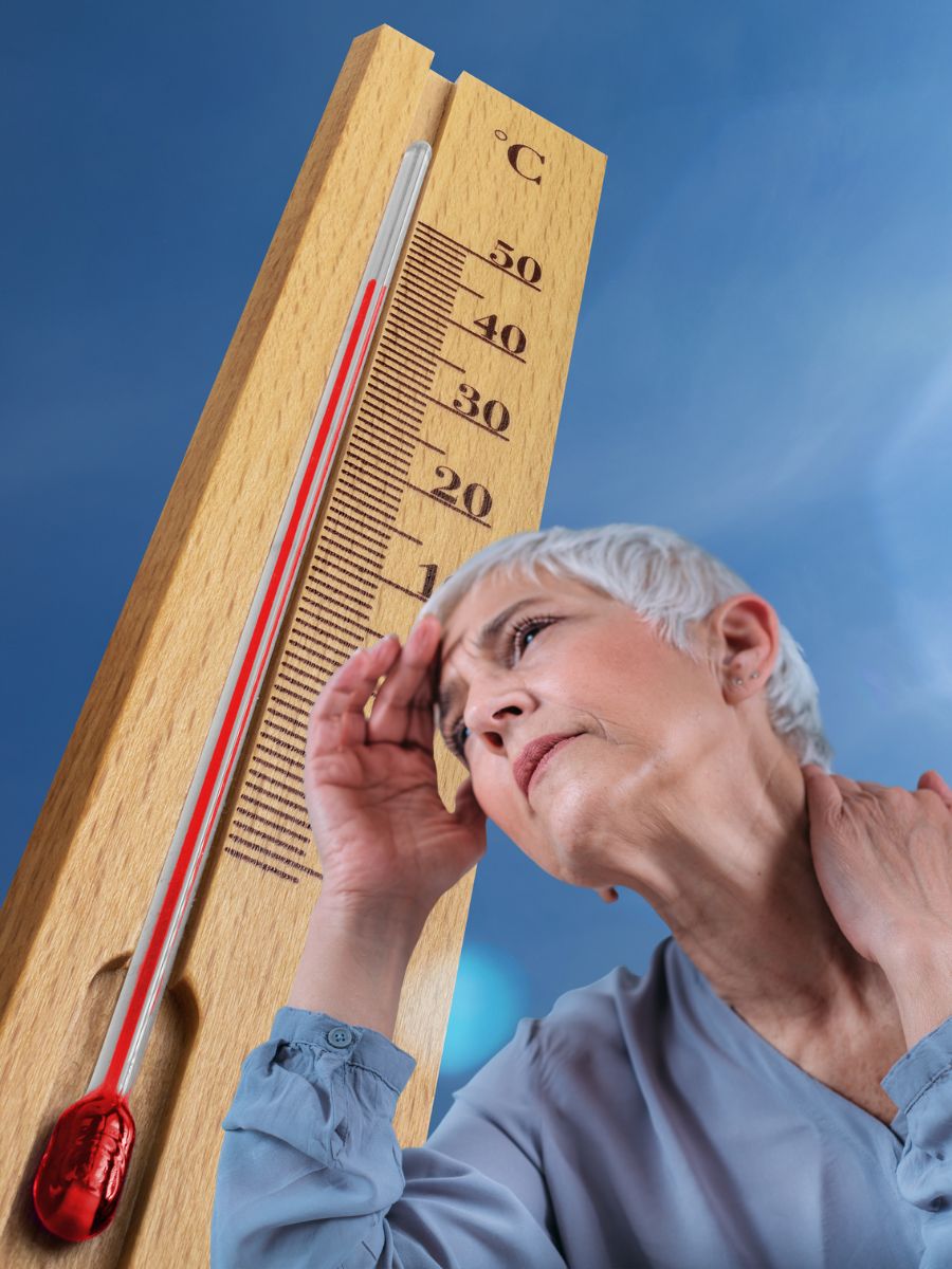 Amețeli bruște în mijlocul unui val de căldură. Femeie termometru cald