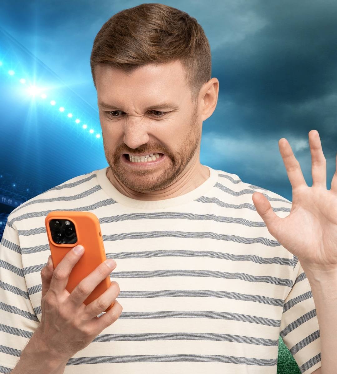 Germania a pierdut la penalty-uri, cancelarul a felicitat echipa. În imagine, un fan nedumerit își priveește telefonul