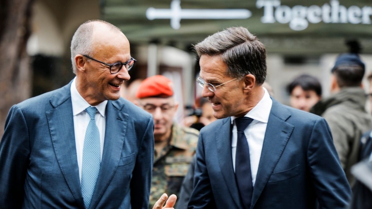 Friedrich Merz alături de secretarul general NATO Mark Rutte la ceremonia de la Münster
