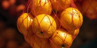 Mandarine în plasă în supermarketuri. Iată de ce nu ar trebui niciodată să le cumperi